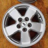 Roue en aluminium usagée Ford Silver / Dimensions : 16x7 / Boulons : 5x114.3mm