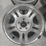 Roue en aluminium usagée Ford Silver / Dimensions : 15x7 / Boulons : 5x114.3mm
