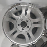 Roue en aluminium usagée Ford Silver / Dimensions : 15x7 / Boulons : 5x114.3mm