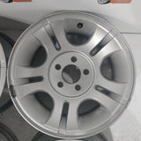 Roue en aluminium usagée Ford Silver / Dimensions : 15x7 / Boulons : 5x114.3mm