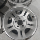 Roue en aluminium usagée Ford Silver / Dimensions : 15x7 / Boulons : 5x114.3mm
